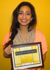 Daisy Buenrostro, with the Cultural Wellness Center Engaged Citizen Award presented to her at the Backyard Initiative All CHATS meeting, February 21.